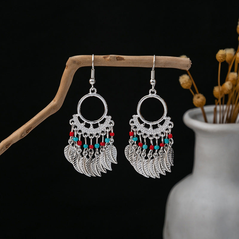 Wholesale Bohemian Ethnic Style Feather Tassel Alloy Earrings